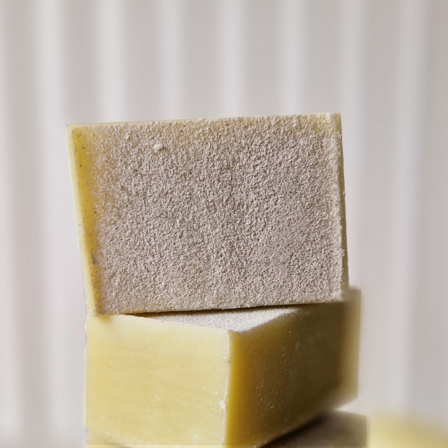 Foot soap with crushed pumice stone